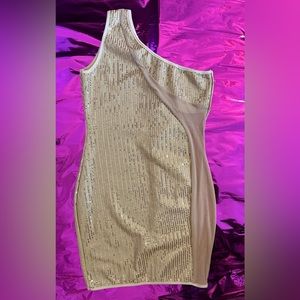 Cute Sequin dress with sheer side.